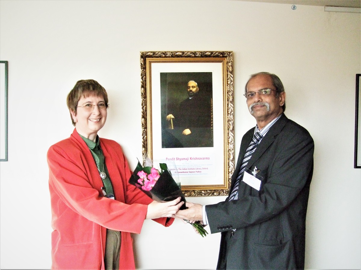 MR HEMANT PADHYA PRESENTING  PANDIT SHYAMAJI KRISHNAVARMA'S PORTRAIT TO INDIAN INSTITUTE LIBRARY AT OXFORD UNIVERSITY, OXFORD